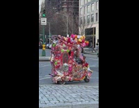 Pink-Wrapped Electric Motorcycle Turns and Leaves