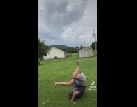 Collab BitchIG2 - Girl in white visor does somersault flip on grass 