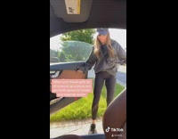 Grey sweater girl opens car door red 