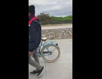 Guy rapping and walking