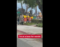 Girl has photoshoot with neon burger sign
