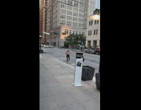 Girl pink top hold beer bus lane