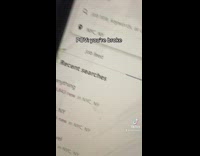 Woman shows sister searching the word anything on job search website