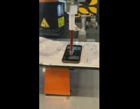 Robot unlocks phone and takes selfie stylus