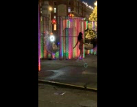 Woman bikini boots ramp walk lights park