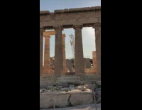 Two woman white dress photoshoot at Athens ruins