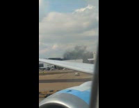 Submitter films fire from car explosion