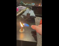 Slow Motion Transfer of Flame to Lighter 