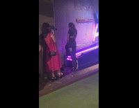 girl foot on arcade game picture