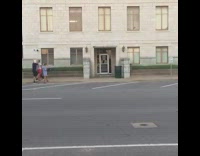 Guy black clothes parkour jump fail hits stomach miss white building