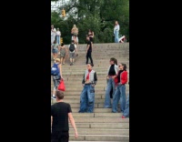 Collab WINY - Models on the stairs women painted statues and man with snake park