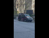 Police officer put penalty tickets at the car park 