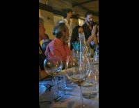 Dad Cringes at Street Performers near Dinner Table