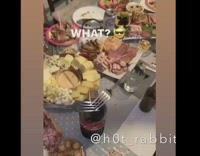 Two forks balance on match stick balancing on neck of coke bottle 