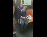 Man does his hair using a handheld mirror on the subway train #BluePointWhatTheL