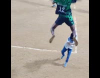 Man jumps and kicks kid on face