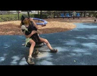 Little girl toy skeleton hug spin playground