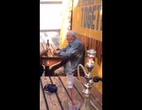 Guy narrates conversation grandpa white visor table