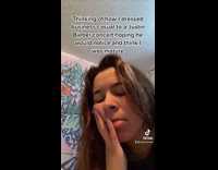 Girl dressed business casual to bieber concert 