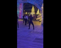 Man dance at tunnel full of lights