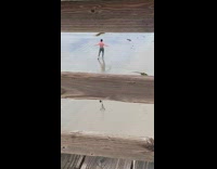 Collab Kook Of The Day - man flex alone beach tripod