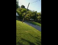 Guy slides barefoot across wet asphalt fail