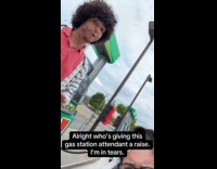 Woman recording video with gas station attendant 