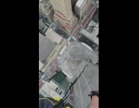 Man hooked to top of NYC building views