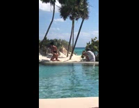 Girl poses edge of pool
