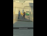 Girl poses by airplane chain fence sunset 