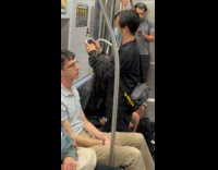 Collab WINY - Guy plays console stand in front of girl that leans on his stomach