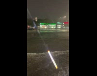 Street Gets Flooded as Heavy Rain Pours