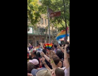 Crowd cheering for pride parade