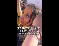 Woman crashes the rally then escorted away