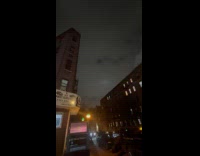 Four lights spots move on night sky