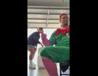 Friend throws beer at elf costume guy 