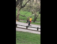 Two guys blast music dance at park