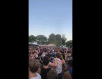 Mosh pit fight at lollapalooza in outdoor stage concert
