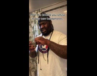 Guy adjusts headphone cord until song plays 