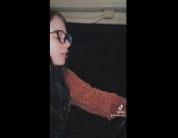 Woman running appears from darkness next to golf cart