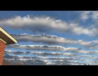 Clouds with spaces apart like waves sky