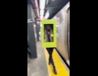 Girl inside Bratz box walks in platform