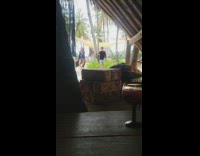 Couple dance tiktok outside hut tent glass