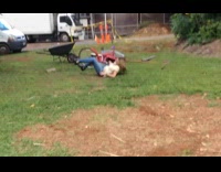 Girl rides bicycle over makeshift ramp falls fail 