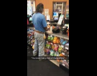 Man blue shirt bagel in plastic bag tied to belt loop