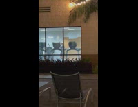 Boy in a cap tiktok dance inside the gym