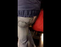 Person on escalator with thong over jeans 