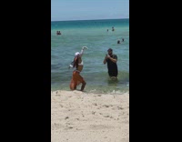 Girl white sleeves orange cloth dance beach