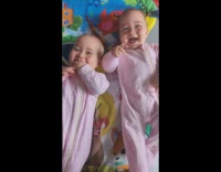 Two babies laugh when mother says bloop