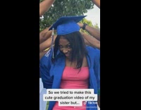 Blue graduation gown cap girl pink dress 